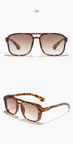 Detailed view of tortoiseshell steampunk sunglasses featuring gradient brown lenses.