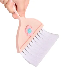 Small portable mini cleaning brush with pink floral design for desktop and keyboard