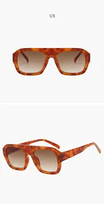 Oversized square aviator sunglasses featuring a tortoise shell frame and gradient lenses