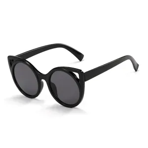 Stylish black cat-ear sunglasses for kids with UV protection, cute and classic design