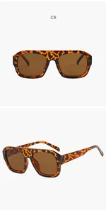 Detailed view of tortoiseshell aviator rectangular sunglasses with brown lenses