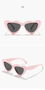 Detailed multi-angle views of pink heart-shaped candy-colored sunglasses for children