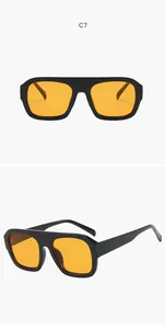 Detail view of square aviator sunglasses featuring black frames and vibrant orange lenses.