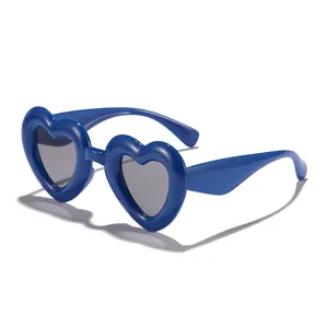 Retro children's heart-shaped sunglasses in vibrant blue with protective UV lenses