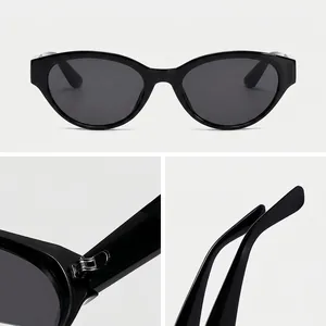 Retro zwarte cat-eye zonnebril met UV-bescherming voor een stijlvolle outdoor mode-uitstraling