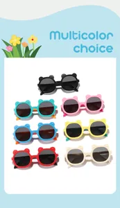 Seven pairs of colorful bear-shaped sunglasses for kids in various bright shades.