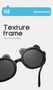 Close-up detail of stylish black children's sunglasses with cute bear ear frames