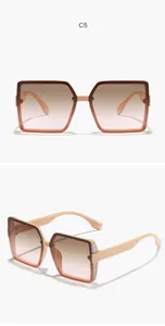 Oversized square frame sunglasses with gradient lenses and glitter accents on the temples