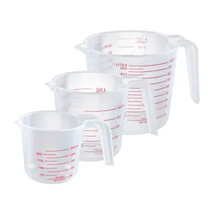 Set of three food-grade transparent plastic measuring cups with handles and red metric scales