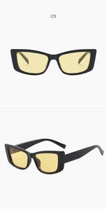 Λεπτομερής προβολή vintage μαύρων γυαλιών ηλίου cat-eye με φιμέ κίτρινους φακούς υψηλής ποιότητας
