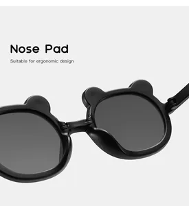 Detail showing the ergonomic nose pad design of cute cartoon bear ear sunglasses for kids