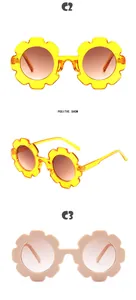 Detailansicht der niedlichen blumenförmigen Kindersonnenbrille in Gelb und Beige.