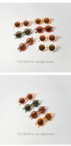 Detailed view of various colorful round sunglasses for children in trendy Morandi shades