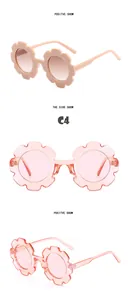 Detail der blumenförmigen Kindersonnenbrille in Beige und Transparent-Pink