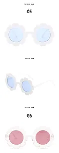 Detailansicht der modischen Kinder-Sonnenbrille in Blumenform mit weißen und rosa Rahmen