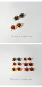 Detail view of colorful round children's sunglasses in various matte shades