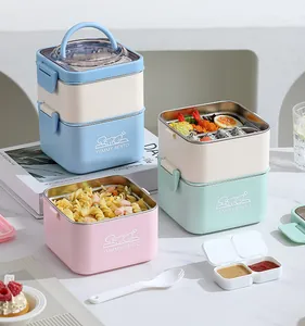 Detail view of square stainless steel bento boxes with handles in pastel colors