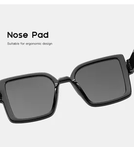 Detailed view of ergonomic nose pads on black square frame kids sunglasses for comfort