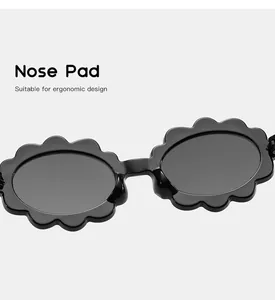 Detail view of children's flower-shaped sunglasses with ergonomic nose pad for comfort.