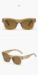 Close-up of vintage square tan sunglasses with translucent frames and tinted lenses