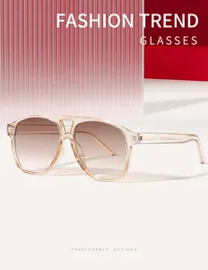 Occhiali da sole aviator rétro con montatura champagne e lenti sfumate marroni per moda unisex
