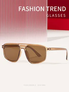 Stilvolle Unisex-Aviator-Sonnenbrille in Teefarbe mit UV-Schutz für den Außenbereich.