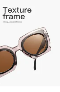 Close-up macro detail of cat-eye sunglasses with a glossy brown transparent frame