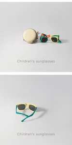 Detail view of foldable children's sunglasses with a compact beige storage case