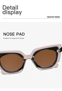 Macro detail showing the ergonomic nose pad of pink cat-eye fashion sunglasses.