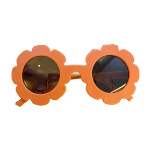 Modische orangefarbene Kindersonnenbrille in Blumenform mit UV-Schutz für Mädchen