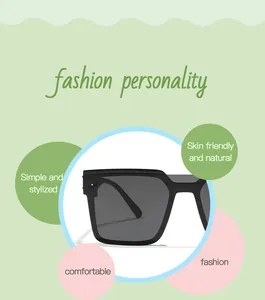 Detail view of stylish black square-frame sunglasses for children with fashion text.