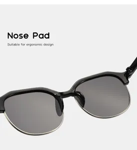 Macro detail of ergonomic integrated nose pad on black kids' half-frame sunglasses