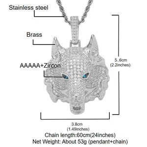 Detailed macro view of iced out silver wolf head pendant with blue eyes and metal chain