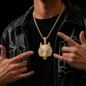 Close-up detail of a hip-hop gold wolf head pendant necklace with micro-pave CZ stones
