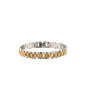 Detailed view of a two-tone stainless steel watch band style link bracelet.