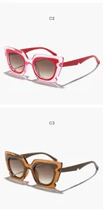 Two pairs of trendy oversized cat-eye sunglasses in red and tea brown finishes