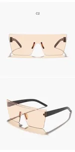 Modern oversized rimless square shield sunglasses with amber lenses for unisex street style.