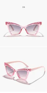 Pink glitter cat eye sunglasses for girls with rhinestone accents and gradient lenses