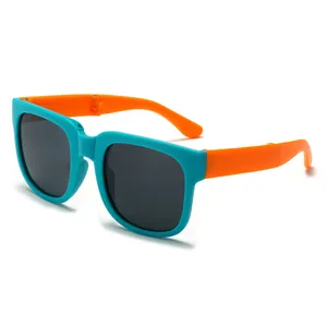 Foldable children's sunglasses with blue frames and orange temples, UV protection