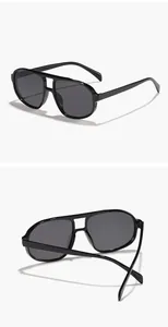 Detail view of retro oversized aviator sunglasses with stylish double bridge design