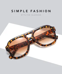 Angled detail of retro tortoiseshell square sunglasses with double-bridge design