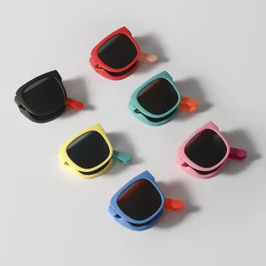 Collection of colorful folding sunglasses for kids in various bright matte finishes