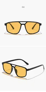 Detailansicht der Unisex-Pilotensonnenbrille mit Hohlbrücke und bernsteinfarbenen Gläsern