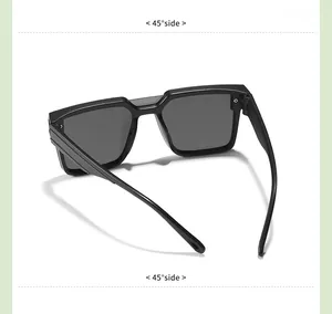 Macro 45-degree side angle view of black square-frame kids fashion UV sunglasses