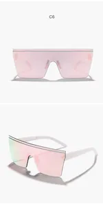 Detailed view of oversized rimless sunglasses featuring a pink mirrored lens and white temples.