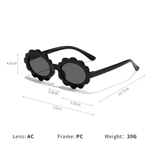 Cute children's flower frame sunglasses with black oval lenses for outdoor sun protection