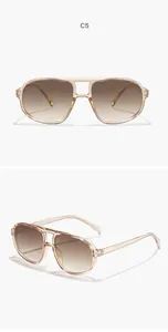 Detailed view of retro oversized double bridge aviator sunglasses with gradient lenses