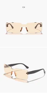 Front and side view detail of vintage rectangular rimless sunglasses with amber lenses