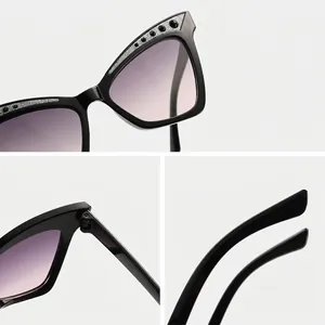 Children's stylish cat-eye sunglasses with glitter rhinestones and delicate frame details.