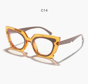 Side view of translucent orange cat-eye anti-blue light glasses with unique notched frame